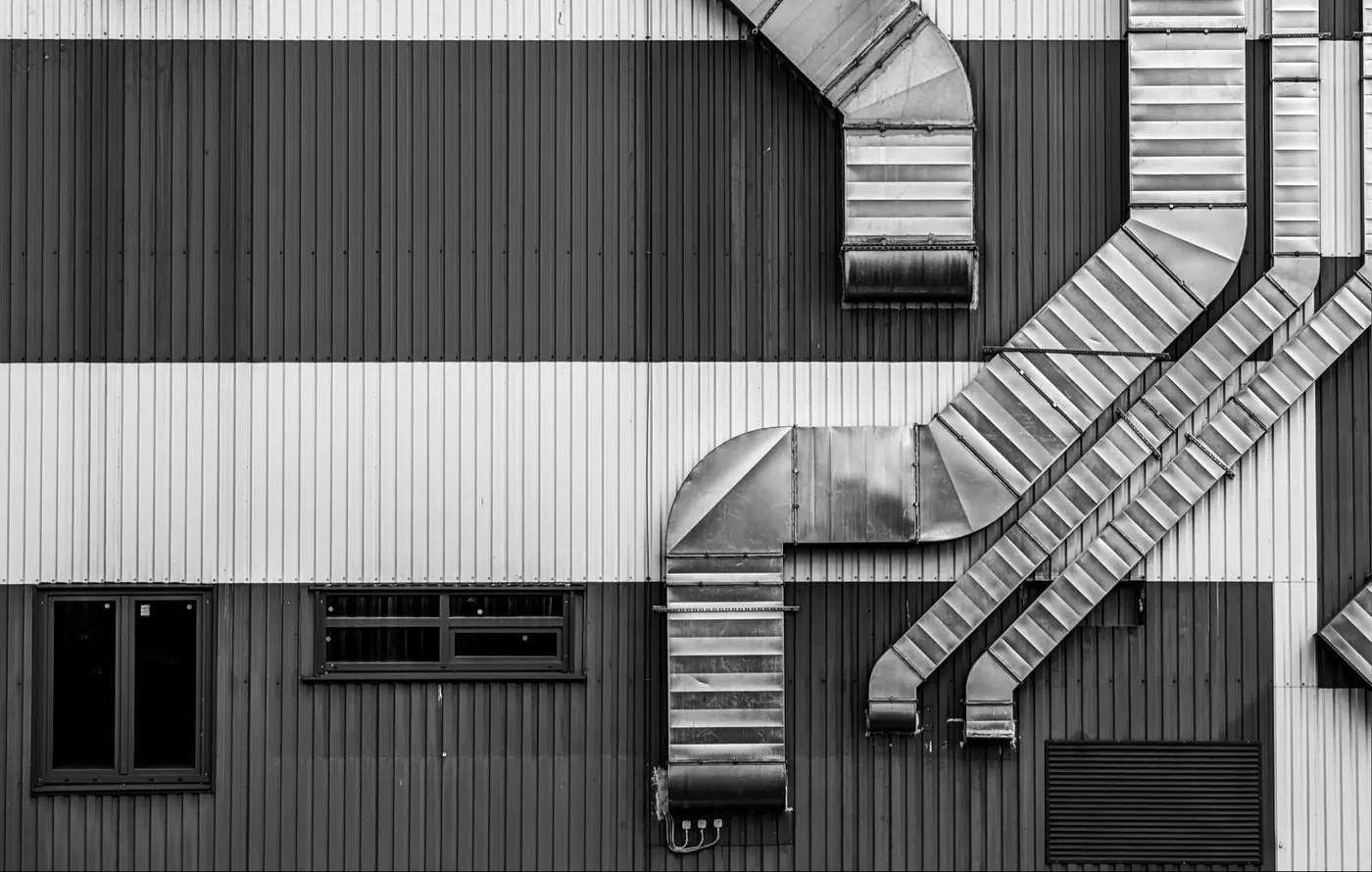 Ductwork running across a building wall.